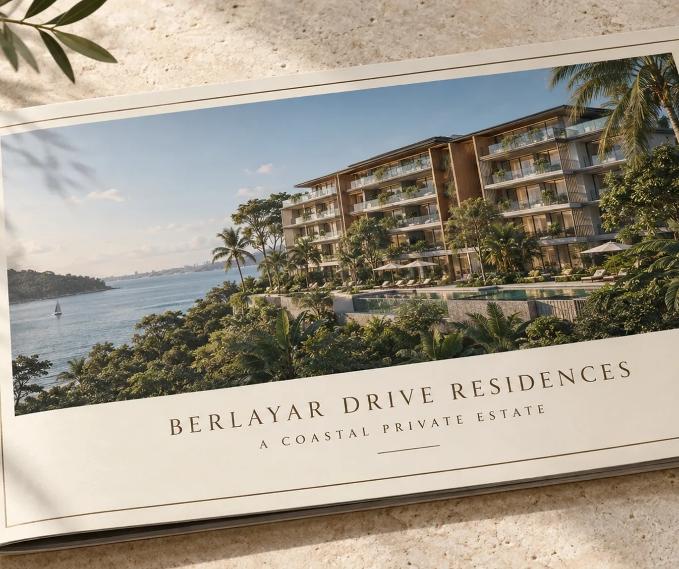 Berlayar Drive Residences e-brochure preview showing a cover with low-rise waterfront blocks above an infinity pool and the sea